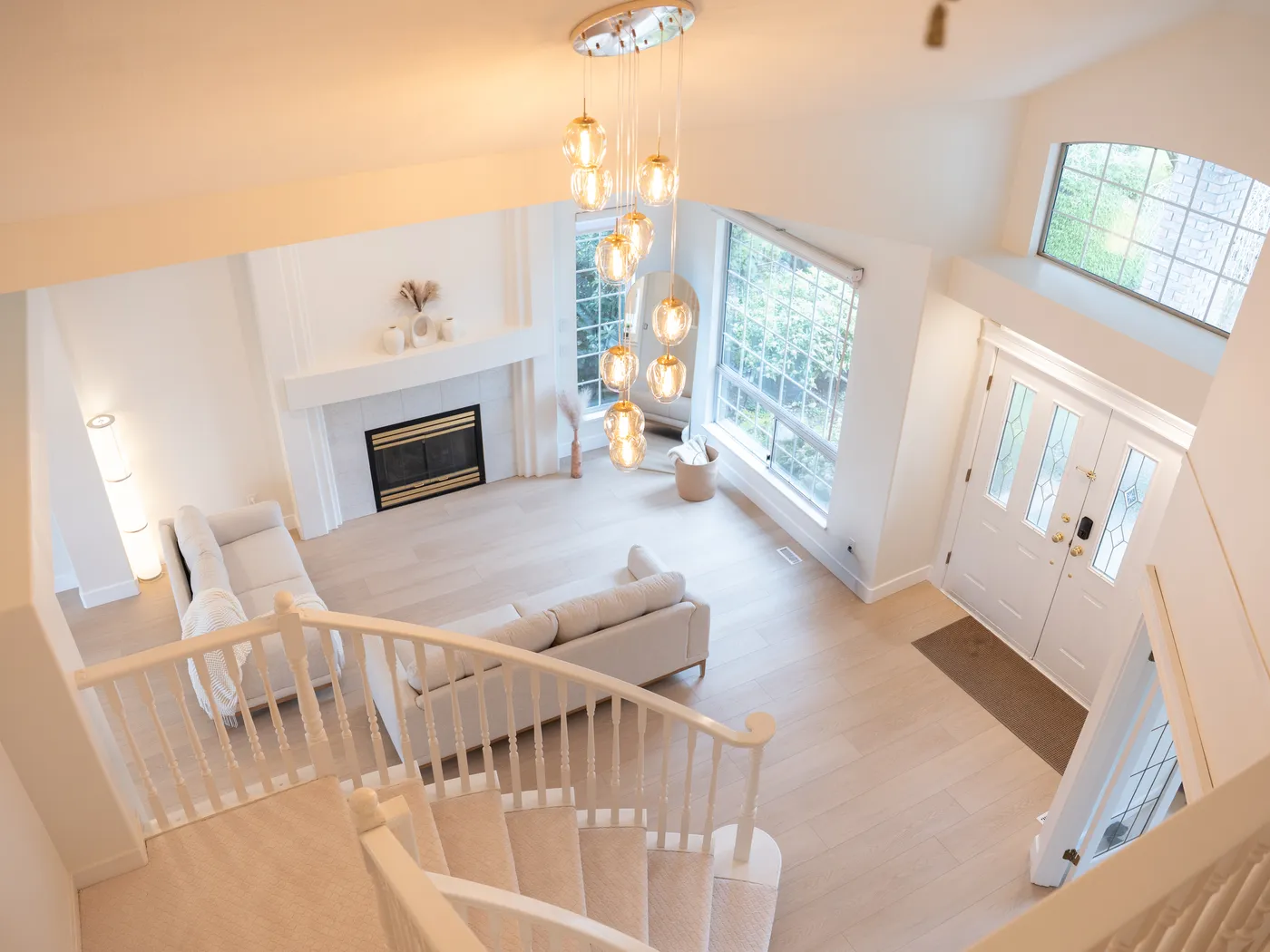 View from the landing over the living room and entry
